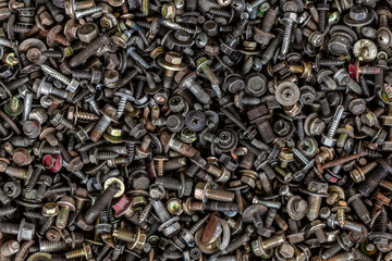 Flat Lay metal fasteners: vinitics, screws, nuts, nails, interchangeable heads, top view. Close-up Carpenter's Tool Kit