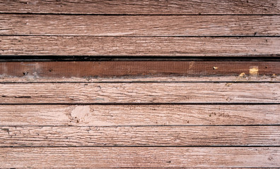 The texture of the old wooden fence painted board, the background floor.