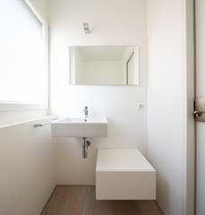 Obraz na płótnie Canvas Front view with sink, mirror and window