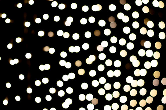 Round bokeh lights on Christmas night on the background