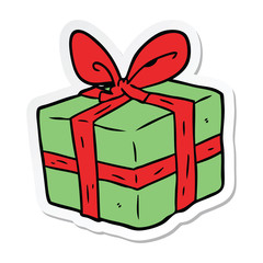 sticker of a cartoon wrapped gift