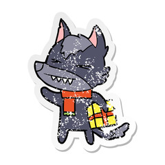 distressed sticker of a angry christmas wolf cartoon
