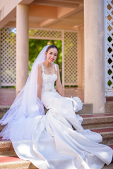 Naklejka premium Wedding concept. Beautiful bride with bouquet