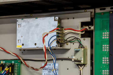 The background of the electronic equipment set (power cord, plug), inside the elevator kit, for machine improvement, to be able to use again
