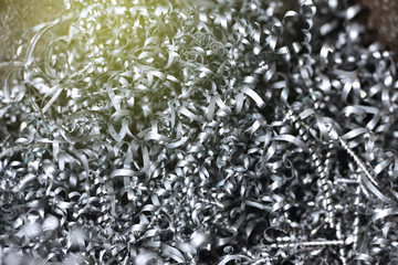 A lot of metal shavings after working on a milling machine or CNC machine. Metal shavings texture