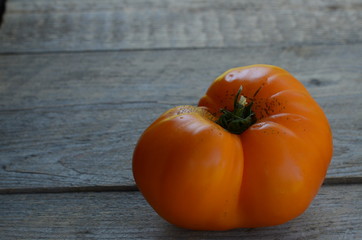 Tomato vegetable orange wooden background