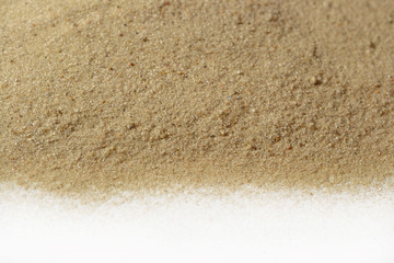 Beach sand on white