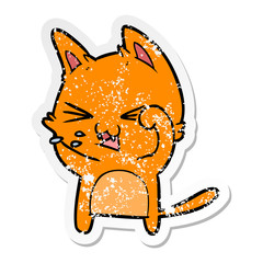 distressed sticker of a cartoon cat hissing