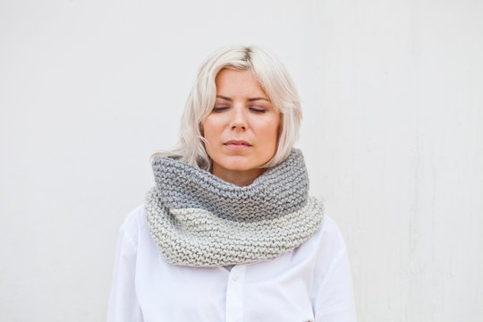 Pretty Young Woman In Warm Grey Wool Knitted Snood