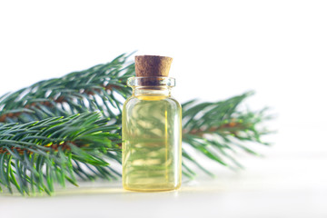Essence of pine on table in beautiful glass jar