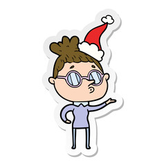 sticker cartoon of a woman wearing glasses wearing santa hat