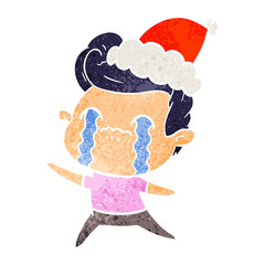 retro cartoon of a man crying wearing santa hat