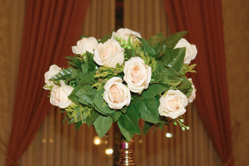 Decorative flowers on the background of curtains