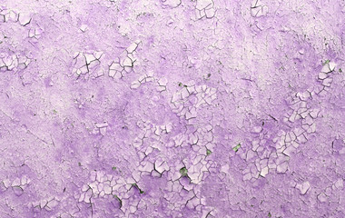 Old wooden background with remains of pieces of scraps of old paint on wood. Texture of an old tree, board with paint, vintage background peeling paint. 