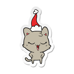 happy sticker cartoon of a cat wearing santa hat