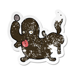 retro distressed sticker of a cartoon dog sticking out tongue