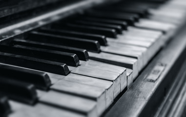 Old piano keyboard close up