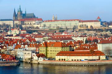 Fototapeta na wymiar Beautiful view of embankment of Vltava River, historic district Mala Strana, Prague Castle, Prague, Czech Republic