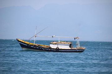 Obraz premium PASSENGER SHIP IN GILI KETAPANG ISLAND, PROBOLINGGO, EAST JAVA, INDONESIA