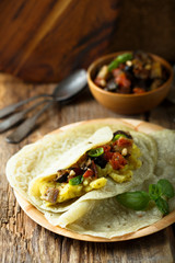 Homemade flatbread stuffed with potato, tomato and eggplant