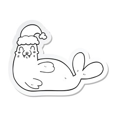 sticker of a cartoon christmas walrus