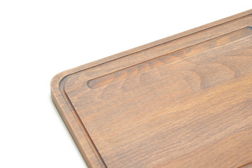 handmade cutting board of unusual shape made of wood close-up on a white background