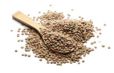 Lentils with wooden spoon isolated on white background