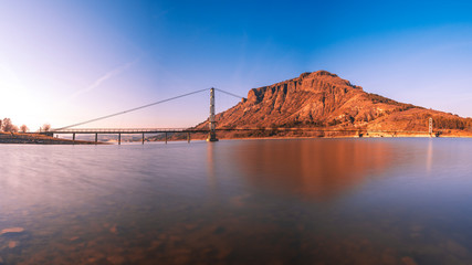 Fototapeta premium The longest suspension bridge in Bulgaria over Studen Kladenez dam with distance between the two towers of 260m. The only way to reach Lisicite village