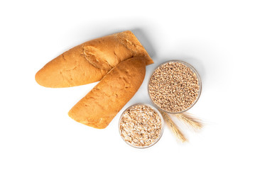 Baguette, wheat and flakes isolated on white background.