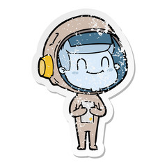 distressed sticker of a happy cartoon astronaut man