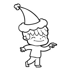 line drawing of a happy boy wearing santa hat