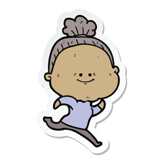 Obraz premium sticker of a cartoon happy old woman