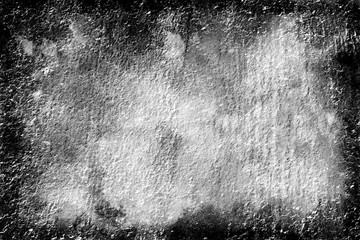 Black and white monochrome texture effect stone background with a black blended border