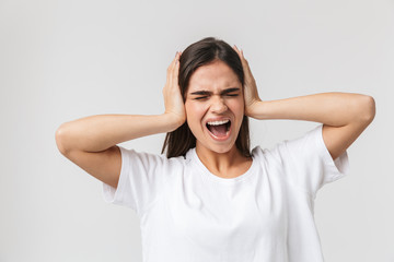 Upset young girl suffering from a headache