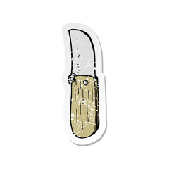 retro distressed sticker of a cartoon folding knife