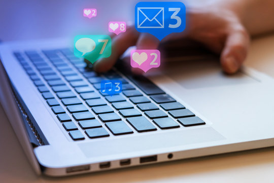 Man is using laptop with black keys, Social media and social networking. Marketing concept