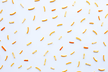 Orange peels on white background.