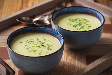 Leek and potato cream soup with cheese.