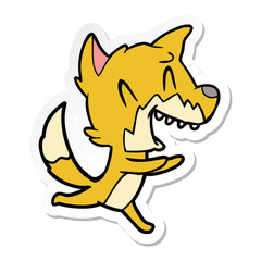 sticker of a laughing fox running away