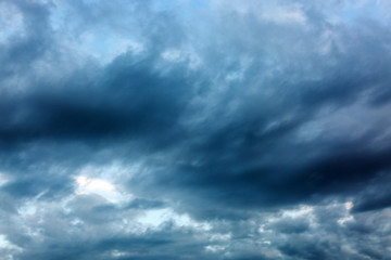Naklejka na ściany i meble Dramatic sky with gray clouds. Abstract background.