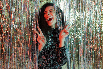 Portrait of a cheerful beautiful woman wearing bright clothes