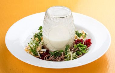 Summer yoghurt cold soup with radish, cucumber and dill. Okroshka.