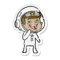distressed sticker of a cartoon laughing astronaut
