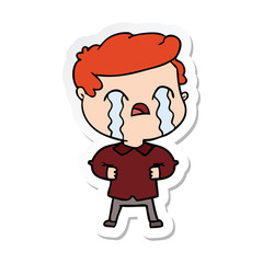 sticker of a cartoon man crying