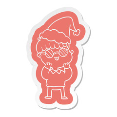 cartoon  sticker of a boy wearing spectacles wearing santa hat