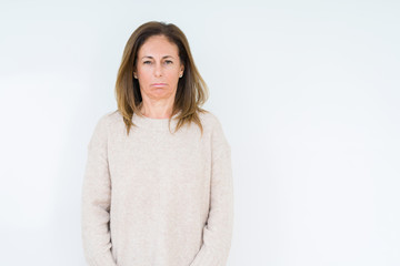 Obraz premium Beautiful middle age woman over isolated background depressed and worry for distress, crying angry and afraid. Sad expression.