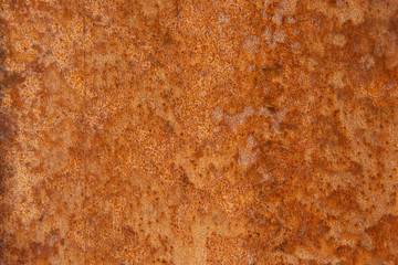 Old Distressed Brown Terracotta Copper Rusty Stone Background with Rough Texture Multicolored Inclusions. Stained Gradient Coarse Grainy Surface
