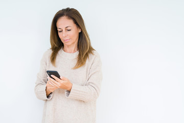 Middle age woman using smartphone over isolated background with a confident expression on smart face thinking serious