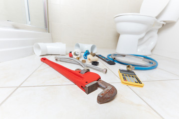 Plumbing tools in the bathroom .