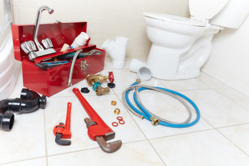 Plumbing tools in the bathroom .